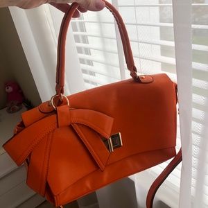 Orange patten leather satchel